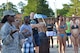 U.S. Air Force Capt. Michelle Law-Gordon, 20 Fighter Wing chaplain reservist talks to Airmen during a dorm pool party, Shaw Air Force Base, S.C., June 11, 2013. The event was put together via a joint effort between the Chapel, Shaw AFB Rising IV and the Dorm Council. (U.S. Air Force photo by Airman 1st Class Ashley L. Gardner/Released)