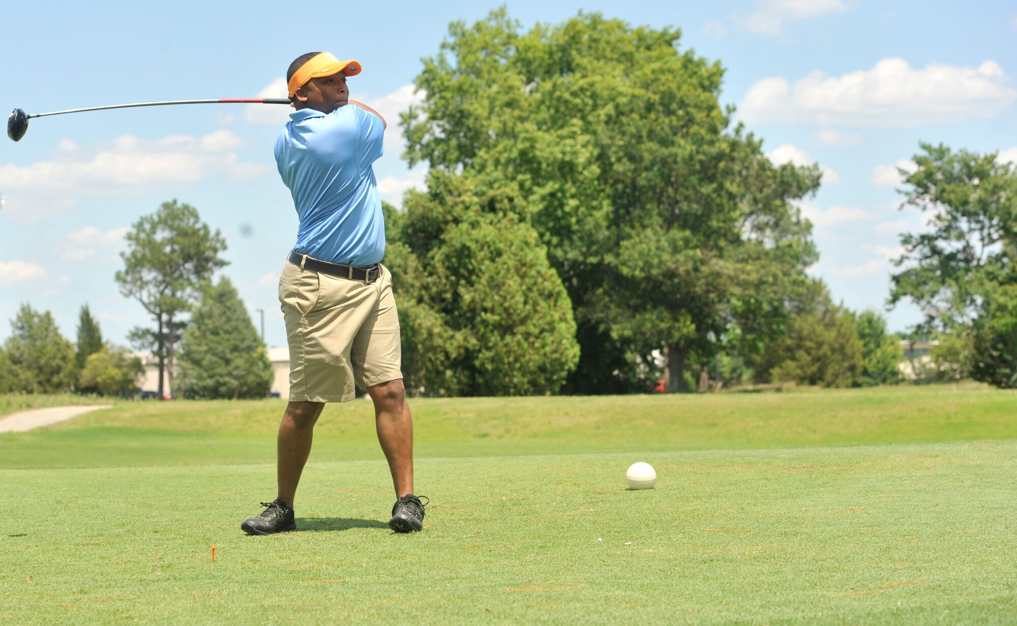 U.S. Air Force Tech. Sgt. Darius Harper, 20th Fighter Wing command chief executive assistant looks down the fairway after his tee shot during the Shaw Chief’s Group annual golf tournament June 14, 2013, Shaw Air Force Base, S.C. More than 100 golfers participated in the annual tournament. (U.S. Air Force photo by Airman 1st Class Jonathan Bass/Released)