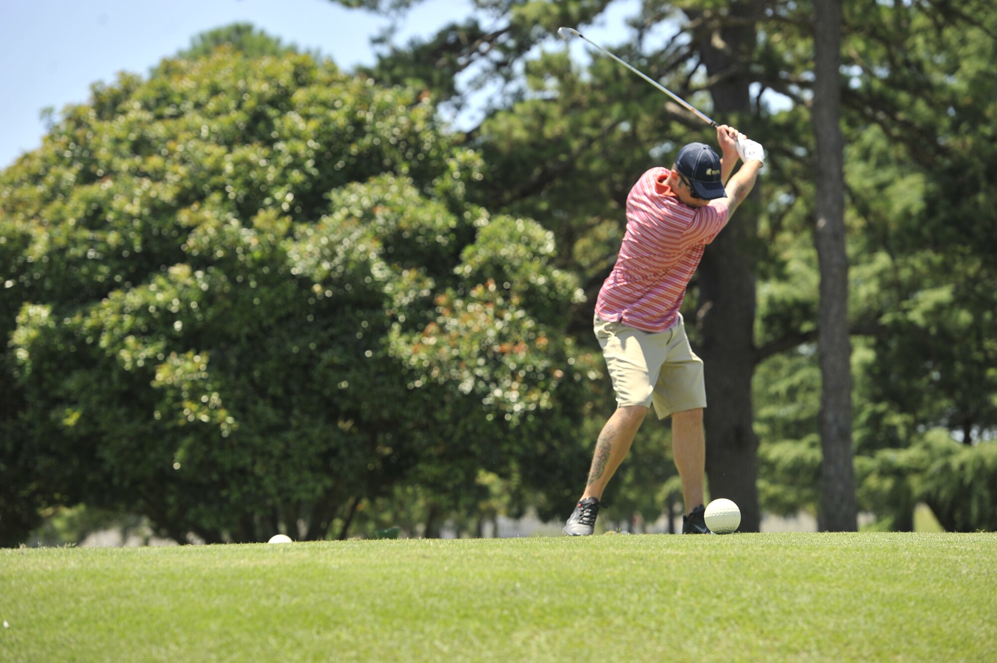 U.S. Air Force Tech. Sgt. Dan Hocter a weather forecaster with the 28th Operational Weather Squadron tees off during the Shaw Chief’s Group annual golf tournament, June 14, 2013, Shaw Air Force Base, S.C. All the proceeds from the tournament went to the junior enlisted Airmen and Soldiers organizations on base. (U.S. Air Force photo by Airman 1st Class Jonathan Bass/Released)