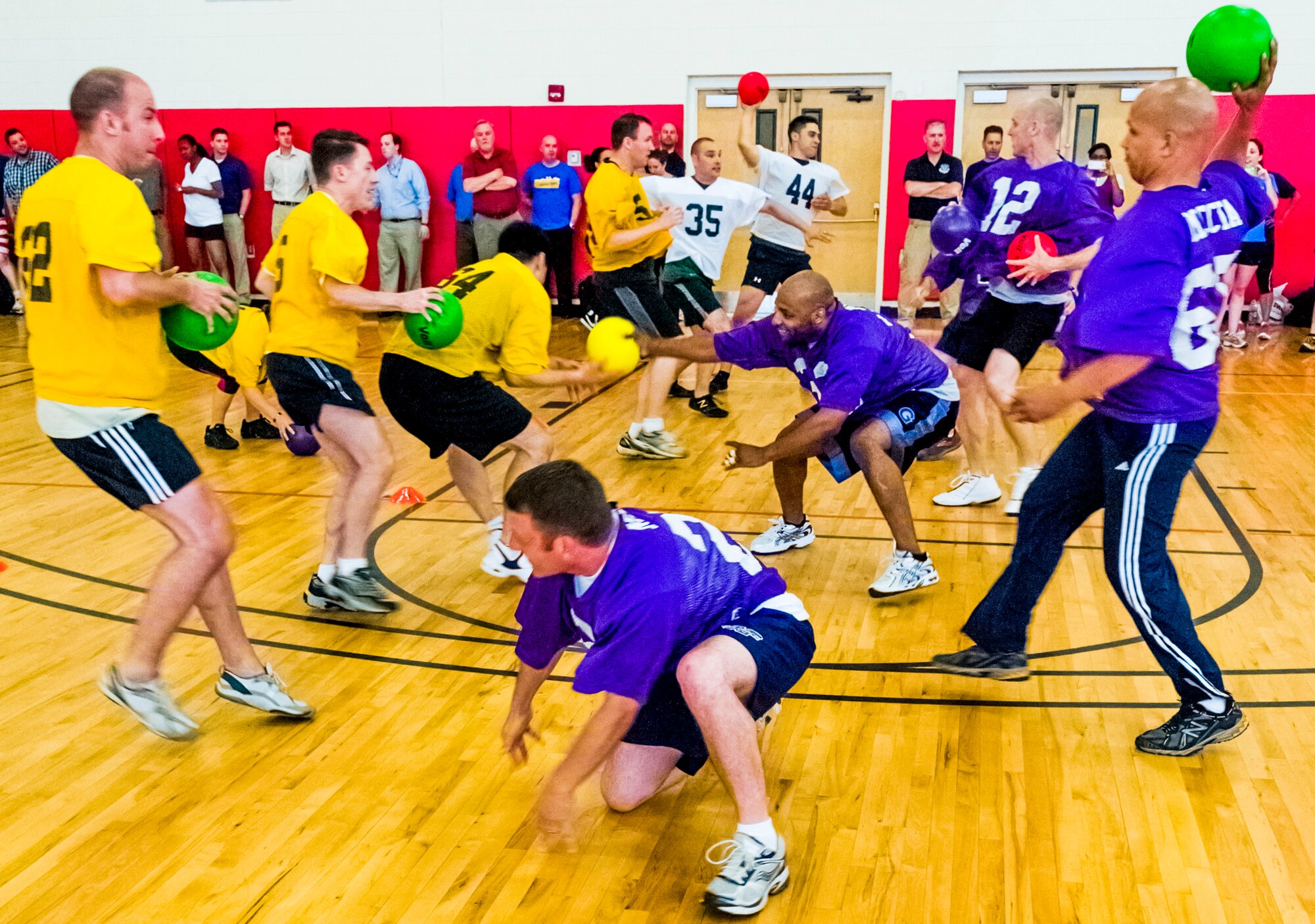 Air Force Office of Special Investigations headquarters members square off in a dodge ball match during a Sexual Assault Response and Prevention Wingman Day June 13 at Quantico, Va. (U.S. Air Force Photo/Mike Hastings)