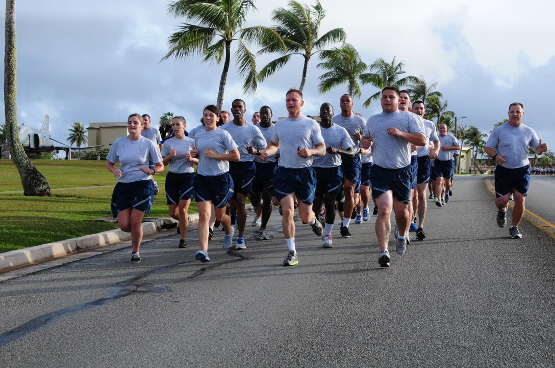 Airmen from the 36th Wing participate in a Wing run at Andersen Air Force Base, Guam, June 14, 2013. Approximately 1,000 service members from the Air Force, U.S. Army and U.S. Navy participated in the run.  (U.S. Air Force photo By Airman 1st Class Mariah Haddenham/Released)