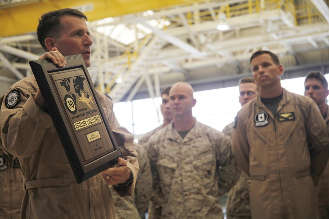 Lt. Col. Shawn R. Hermley, commanding officer of Marine Attack Squadron 231, addresses his Marines and Sailors during a ceremony in which the squadron was recognized by Boeing for achieving 30,000 consecutive mishap-free flight hours. This is the first time in the unit’s history they have been awarded for reaching a milestone of this magnitude. It has taken the squadron a decade to accrue the 30,000 flight hours.