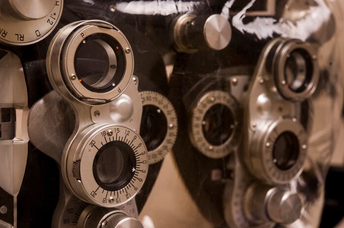 An older model phoropter is pictured at the optometry clinic June 18, 2013, at Joint Base Charleston – Air Base, S.C. A phoropter is an instrument used to test individual lenses on each eye during an exam. The older models usually serve as a backup to newer, more advanced models. (U.S. Air Force photo/ Senior Airman George Goslin)