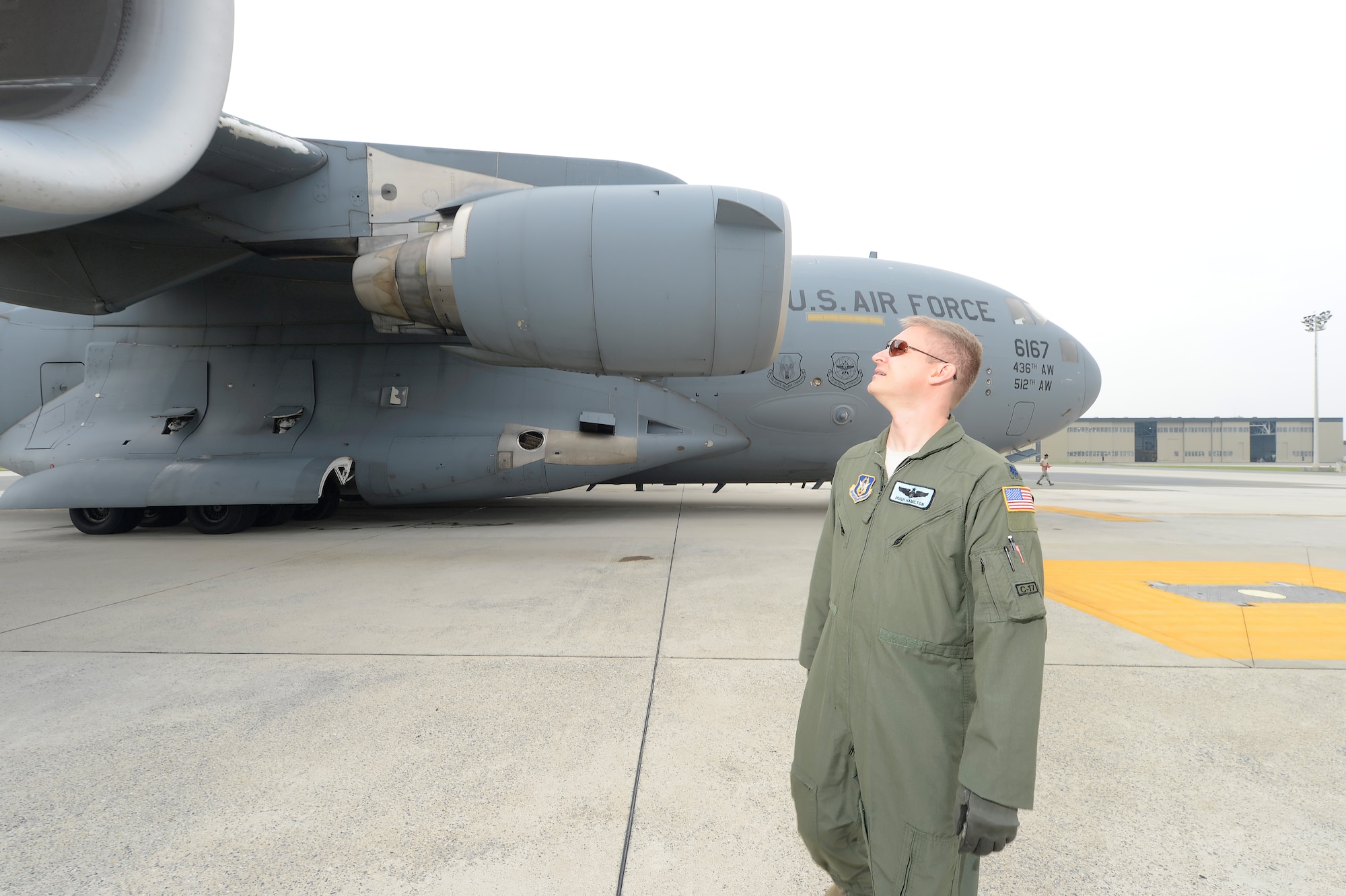 Lt. Col. Hugh Hamilton, 326th Airlift Squadron, 512th Airlift Wing, Air Force Reserve Command, conducts a pre-flight inspection of a C-17A Globemaster III prior to training flight at Dover Air Force Base, Del., on June 18, 2013. Dover's fleet of C-5M and C-17A's are shared by active duty (436th) and reserve (512th) Wings. (U.S. Air Force photo/Greg L. Davis)