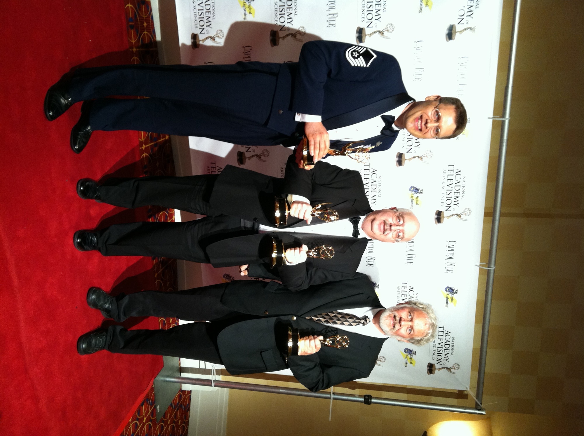 From left to right, Master Sgt. Jim DeVaughn, of The U.S. Air Force Band,
Mr. James Bigwood, audio supervisor at Maryland Public Television (MPT) and
Mr. Gordon Master, freelance audio engineer, formerly with MPT at the local
EmmyR Awards ceremony.
