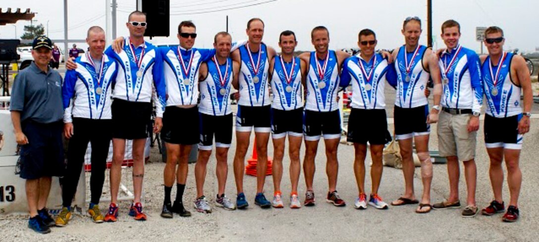 U.S. Air Force male triathletes stand together with their silver medals won in the team portion of the Armed Forces Triathlon, June 1, 2013, at Naval Base Ventura County, Point Mugu, Calif. Both Air Force male and female teams came in second place.  (Ccourtesy photo/Released)