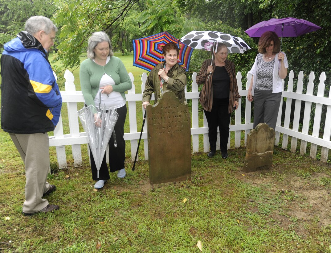 Sixth-generation Darcey family descendants Retired Maj. Gen. Gary Curtin, Sandra Curtin, Karen Curtin, Lee Green and Shelly Muffley visit family cemetery located at Belle Chance, Joint Base Andrews, Md.,  June 7, 2013. Belle Chance is also the home of the assistant vice chief of staff and director, Air Staff, Headquarters, U.S. Air Force. The Darcey family cemetery is one of several private cemeteries in Prince George’s County Md., that pre-dates the Civil War (U.S. Air Force photo/Aletha Frost)