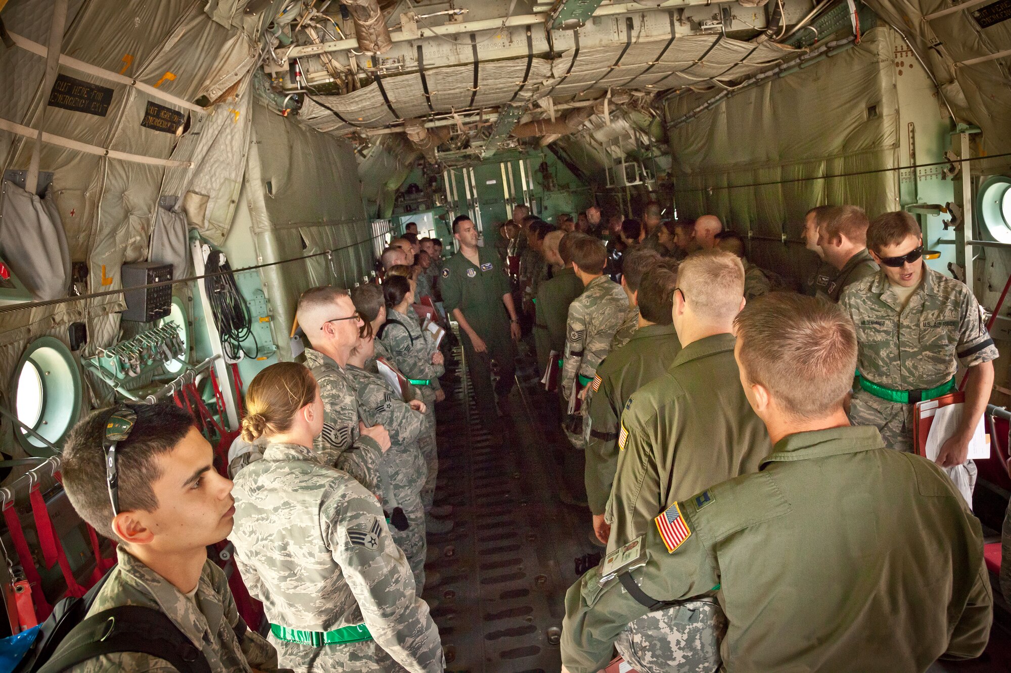 Senior Airman Brian Beckmann, 96th Airlift Squadron loadmaster, takes accountablilty during a "flight" to the deployed location.  Members of the 934th Airlift Wing participated in an Operational Readiness Exercise during the week of June 17-21 at the Minneapolis-St. Paul Air Reserve Station, Minn.  (U.S. Air Force photo/Shannon McKay)