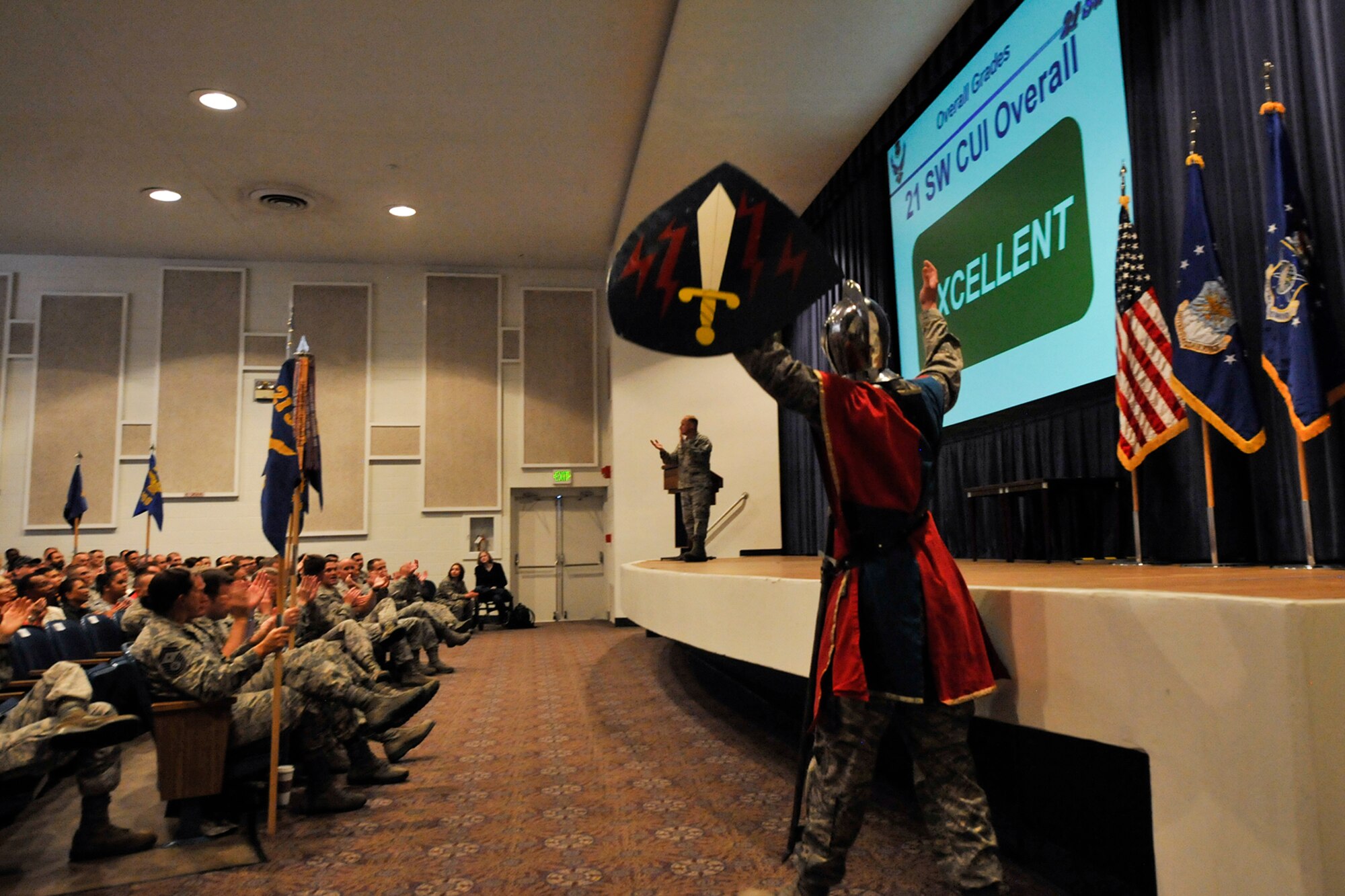 Iron Mike reacts to the consolidated unit inspection “Excellent” result June 18 at the Peterson base auditorium. During the CUI, the 21st SW Knights proved their mettle and garnered six outstanding, 19 excellent, 21 satisfactory and three marginal ratings. (U.S. Air Force photo/Dennis Howk)