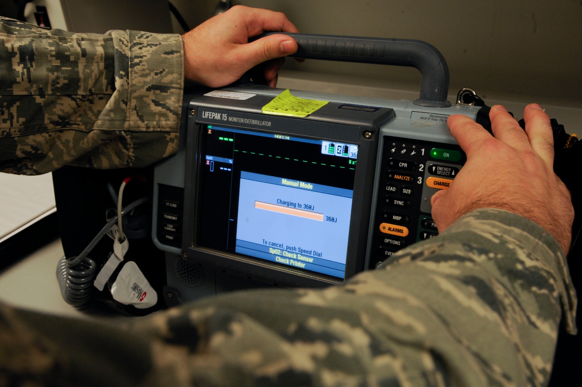 Staff Sgt. Andrew Bouck, 2nd Medical Support Squadron maintenance NCO in-charge, calibrates defibrillators on Barksdale Air Force Base, La., June 18, 2013. The Biomedical Equipment Technician section is in charge of more than 1,300 pieces of medical equipment they must maintain and ensure are serviceable. Equipment ranges from simple blood pressure cuffs to advanced X-ray machines. (U.S. Air Force photo/Airman 1st Class Andrew Moua)