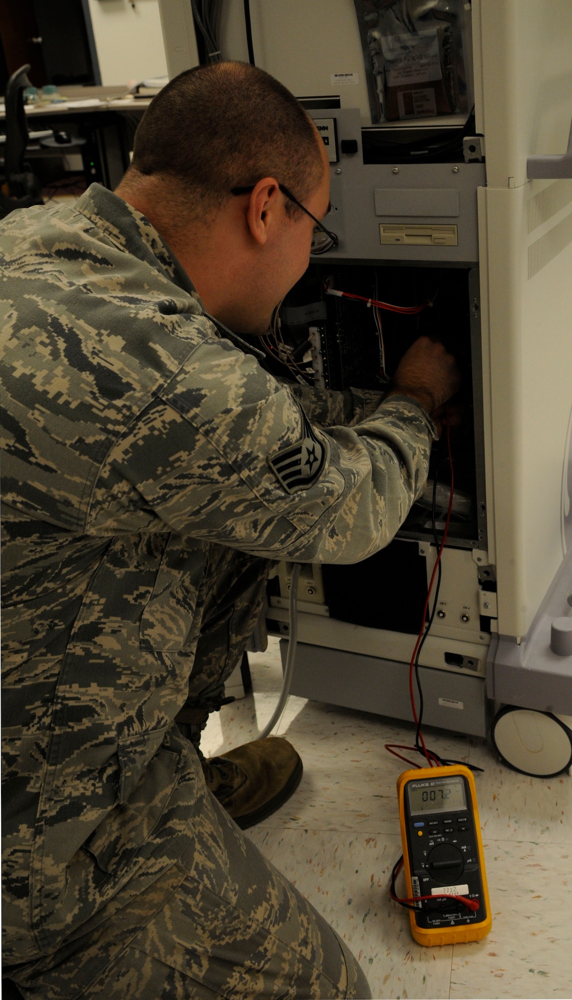 Staff Sgt. Andrew Bouck, 2nd Medical Support Squadron maintenance NCO in-charge, checks the voltage of an X-ray machine on Barksdale Air Force Base, La., June 18, 2013. Biomedical Equipment Technicians are responsible for the maintenance, upkeep and serviceability of all equipment the 2nd MDG uses ranging from pressure cuffs to advanced X-ray machines. (U.S. Air Force photo/Airman 1st Class Andrew Moua)