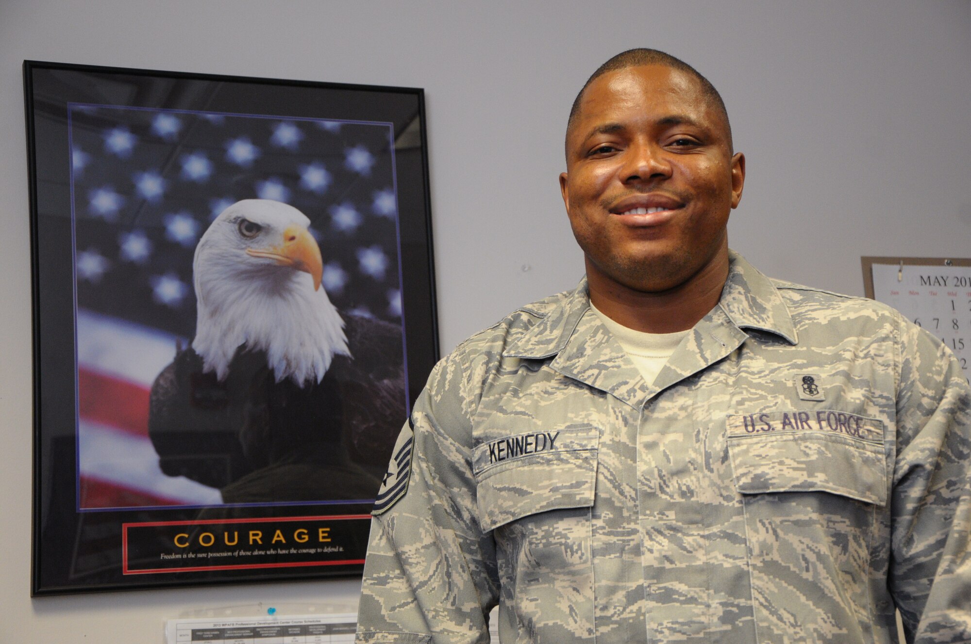 Master Sgt. Pitman Kennedy escaped civil war in Liberia as a teenager and is currently serving as a career assistance advisor and NCO in charge at the First Term Airman Center at Wright-Patterson Air Force Base.  (photo by Niki Jahns)