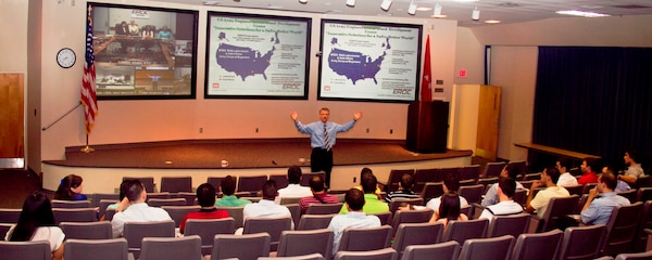 Dr. David Pittman (center) welcomes 36 University of Puerto Rico Mayagüez summer interns to U.S. Army Engineer Research and Development Center laboratories located in Vicksburg, Miss., Hanover, N.H., Champaign, Ill., and Alexandria, Va., during a video teleconference. 