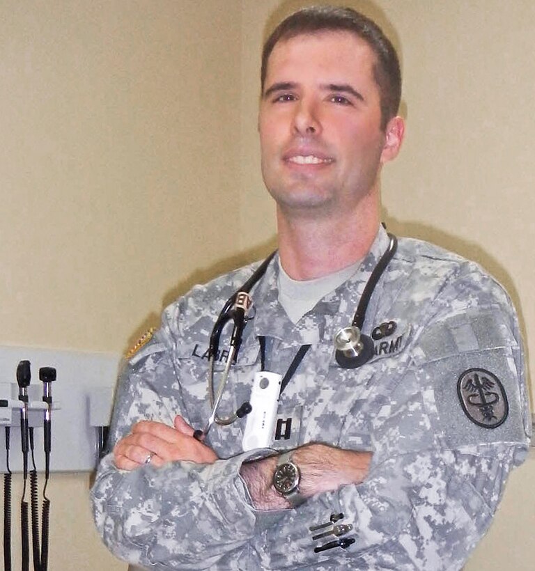 Ten years after being wounded in Iraq, Army Capt. (Dr.) Christian Labra has completed medical school at the Uniformed Services University of the Health Sciences and is about to graduate from a three-year residency at the Fort Belvoir Community Hospital in Virginia. Now he is preparing for his first assignment as a board-certified family physician in Germany. DOD photo by Donna Miles
