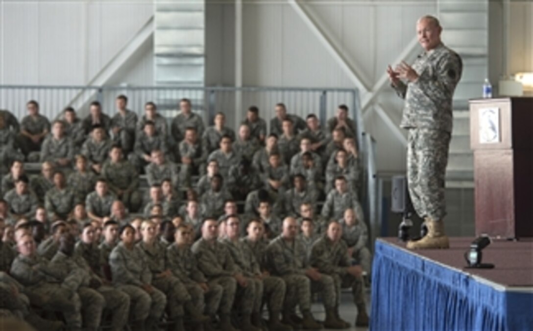 Chairman of the Joint Chiefs of Staff Gen. Martin E. Dempsey talks to airmen from the U.S Air Force’s 5th Bomber Wing and 91st Missile Wing during a town hall meeting at Minot Air Force Base, N.D., on June 17, 2013.  Dempsey is visiting Minot to observe the Air Force Nuclear Triad operations and to talk to airmen assigned to the base.  