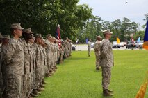 Marines and sailors from 2nd Medical Battalion, 2nd Marine Logistics Group gathered for a change of charge ceremony aboard Camp Lejeune, N.C., June 18, 2013. Master Chief Petty Officer Christopher L. Hill, the command master chief petty officer for the battalion, passed responsibility to Master Chief Petty Officer Michael J. Roberts. (U.S. Marine Corps photo by Lance Cpl. Shawn Valosin)