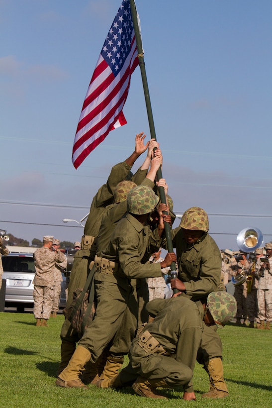 Marines reenact the Iwo Jima flag raising aboard Marine Corps Air Station Miramar, Calif., June 19. The reenactment was in honor of flag day and recaptured the 1945 photo by Joe Rosenthal.