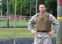 130612-M-PS121-647: Maj. James Pelland, team lead for Marine Corps Systems Command’s Individual Armor Team, wears a prototype Modular Scalable Vest, the next generation body armor for the Marine Corps. The MSV will combine attributes from the two most recently fielded protective vests and is being developed by the armor team.