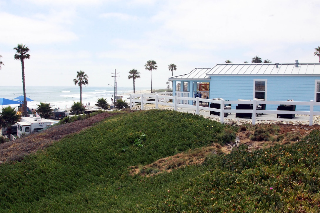 Organizations and companies like the San Diego Nice Guys, Lowes, and the La Jolla and Rancho rotaries contributed time and money to help build four new beach cottages, June 18, for the recreational use of Marines, sailors and their families. 