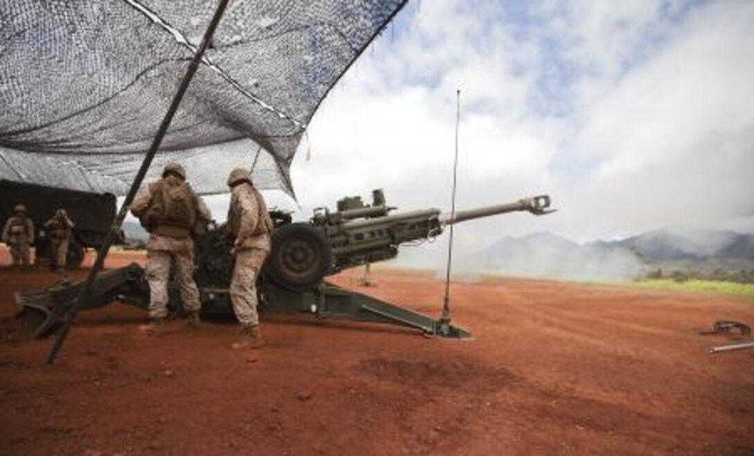 Marines from Alpha Battery, 1st Battalion, 12th Marine Regiment, fire 155 mm artillery shells from an M777 howitzer after receiving a fire mission from their command station at Schofield Barracks, June 11, 2013. The exercise was part of a three-day training exercise called Spartan Fury 13.3, in which the main goal was to ensure the preparedness for providing combat artillery support to 3rd Marine Regiment in their upcoming infantry training exercise. 
