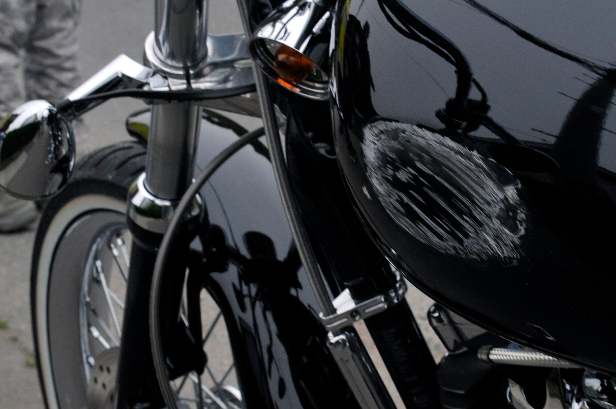 The motorcycle of Master Sgt. Jason Fosco, 35th Maintenance Squadron, is photographed for documentation following an accident outside Misawa Air Base, Japan, June 1, 2013. Fosco was forced to lay down his motorcycle to avoid an intersection collision with a vehicle that ran a stop sign. (U.S. Air Force photo by Airman 1st Class Zachary Kee)