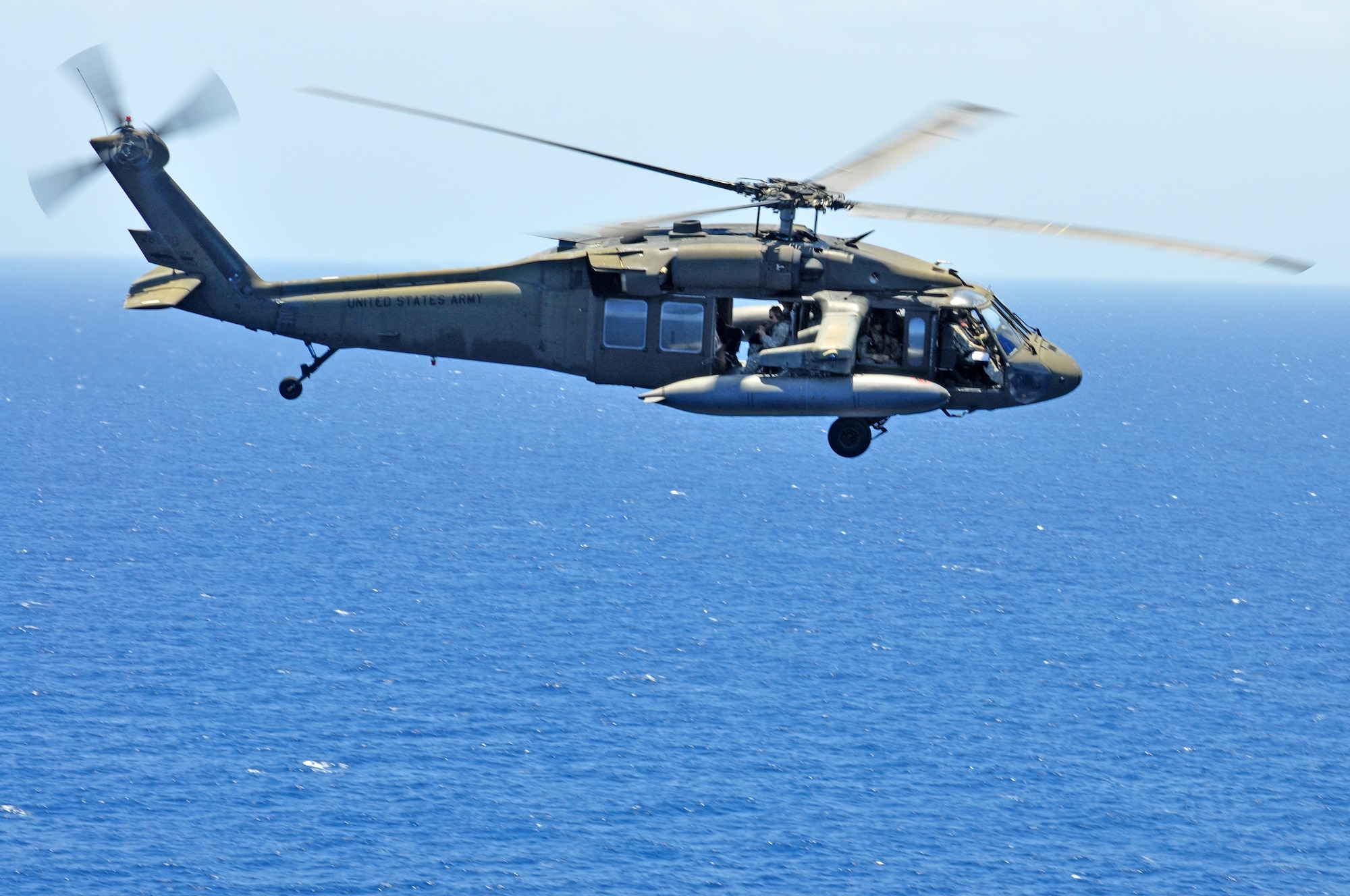 U.S. Army 1st Lt. Martha Hugo, a 1-228 Aviation Regiment Alpha Company pilot, flies one of the two Utility Helicopter-60 Blackhawks from Soto Cano Air Base, Honduras, to the Island of Utila in order to comply with her training scenario June 11, 2012. During the mission the pilots had to rely on their instruments and training as they fly through mountains and over the Caribbean Sea. 