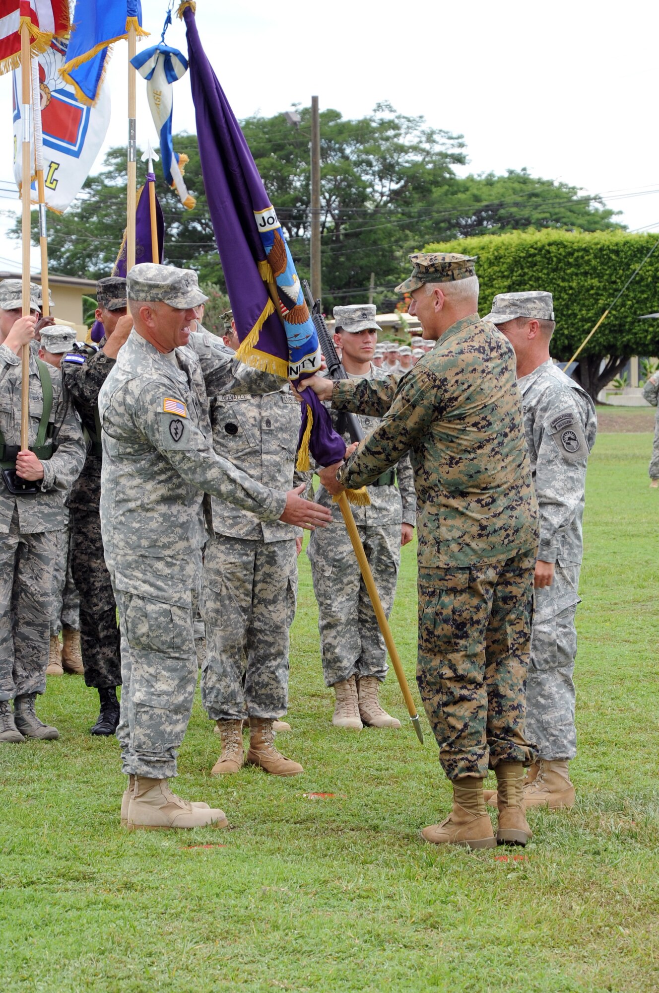 Army Col. Thomas D. Boccardi assumes command of Joint Task Force- Bravo, at Soto Cano Air Base, Republic of Honduras by accepting the guidon from Marine Gen. John F. Kelly, the U.S. Southern Command commander June 20, 2013. Col. Boccardi assumed command from Army Col. Guy A. LeMire. Joint Task Force-Bravo operates on the Honduran military installation, Soto Cano Air Base, in central Honduras and is comprised of more than 600 U.S. military personnel and more than 650 U.S and Honduran civilians. JTF-Bravo works to build partnerships with Honduras and other Central American countries to foster security, stability and prosperity for the Americas.

JTF-Bravo conducts a variety of missions in Central America from supporting U.S. Government operations to counter transnational crime to humanitarian assistance/disaster relief and building partner capacities. The successful completion of these missions allows JTF-Bravo to promote security throughout the region, which is the foundation for stable and productive societies.
