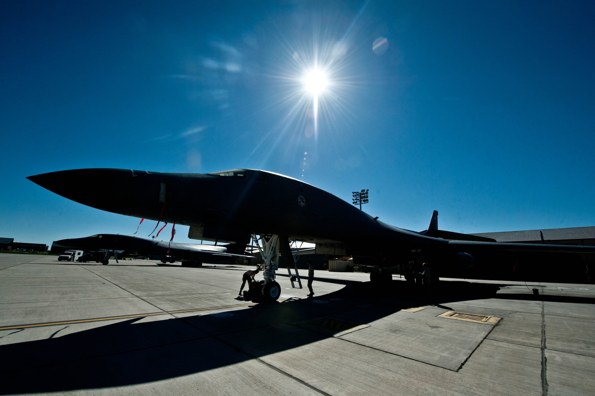 Offensive avionic systems specialists from the 28th Aircraft Maintenance Squadron inspect a B-1 bomber’s offensive electronic systems during routine maintenance at Ellsworth Air Force Base, S.D., June 18, 2013. The 28th AMXS is the largest squadron in the 28th Bomb Wing, with more than 700 Airmen supporting Ellsworth’s combat coded B-1 bombers. (U.S. Air Force photo by Airman 1st Class Zachary Hada/Released)