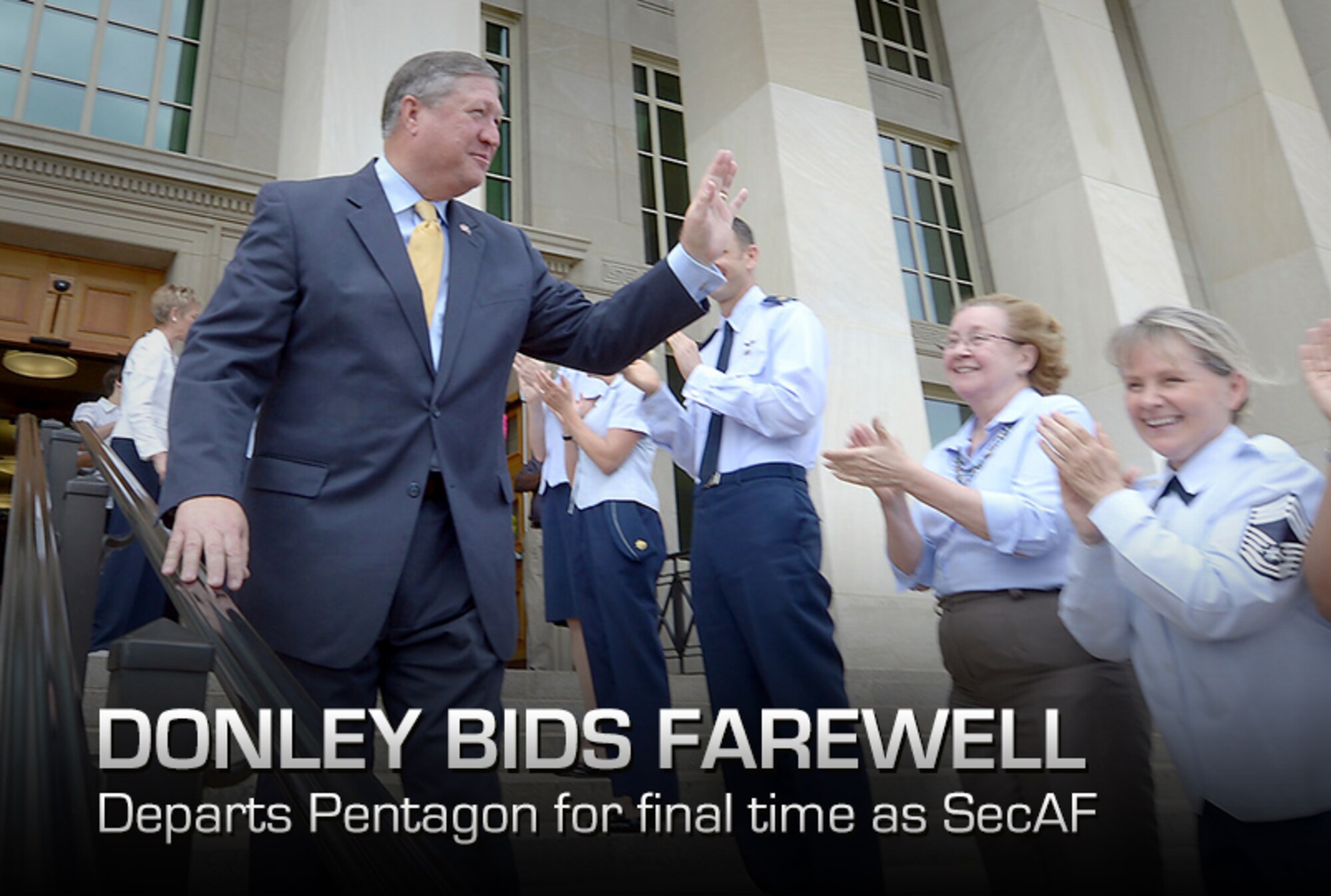 Secretary of the Air Force Michael Donley bids farewell to Airmen while departing from the Pentagon June 20, 2013, for the final time as the Air Force secretary.  Donley was confirmed as the 22nd secretary of the Air Force Oct. 2, 2008.  He served as the acting secretary since June of that year, as well as for seven months in 1993, making him the longest serving secretary in the history of the Air Force.  His departure ceremony is June. 21.  (U.S. Air Force photo/Andy Morataya) (U.S. Air Force graphic/Corey Parrish)