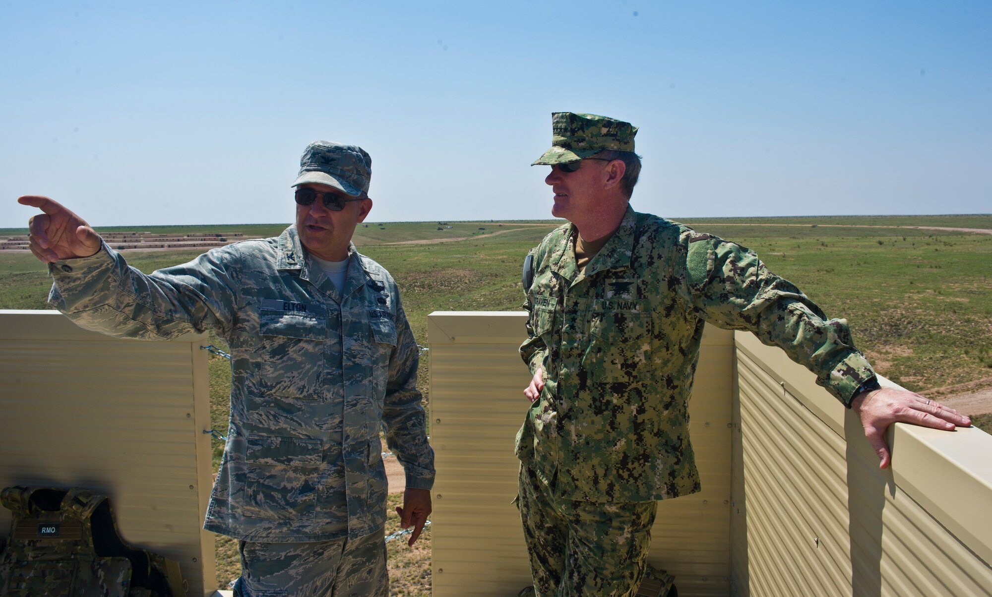U.S. Air Force Col. Buck Elton, 27th Special Operations Wing commander, describes the unique capabilities of Melrose Air Force Range, N.M., to U.S. Navy Adm. William H. McRaven, United States Special Operations Command commander, June 19, 2013. (U.S. Air Force photo/Airman 1st Class Xavier Lockley)