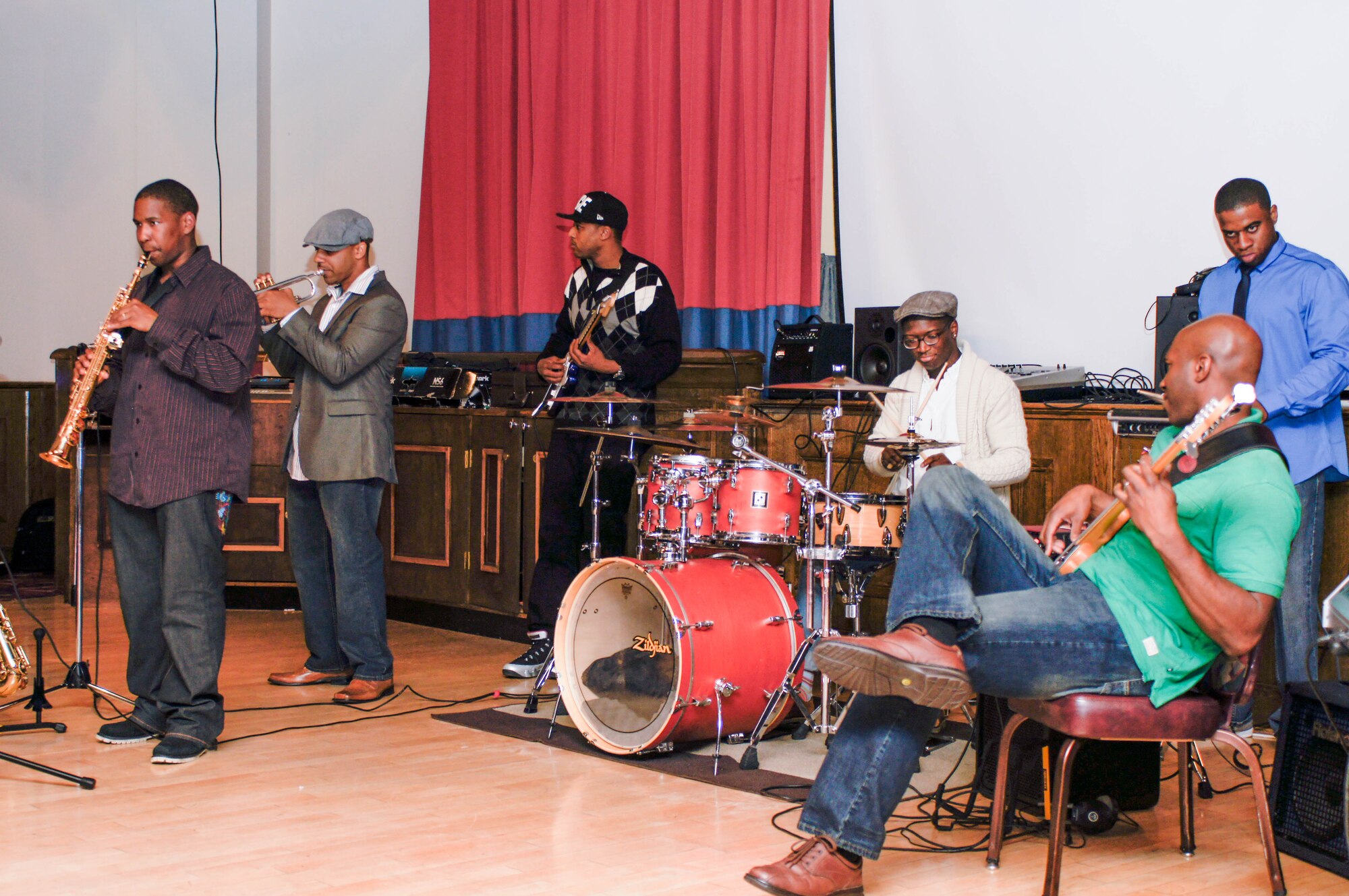 Members of the band We Met Yesterday perform at The Sounds and Poets of Outstanding Talent June 15, 2013, at the Galaxy Club on RAF Mildenhall, England. The showcase also featured poets from the base and local communities. (Courtesy photo)