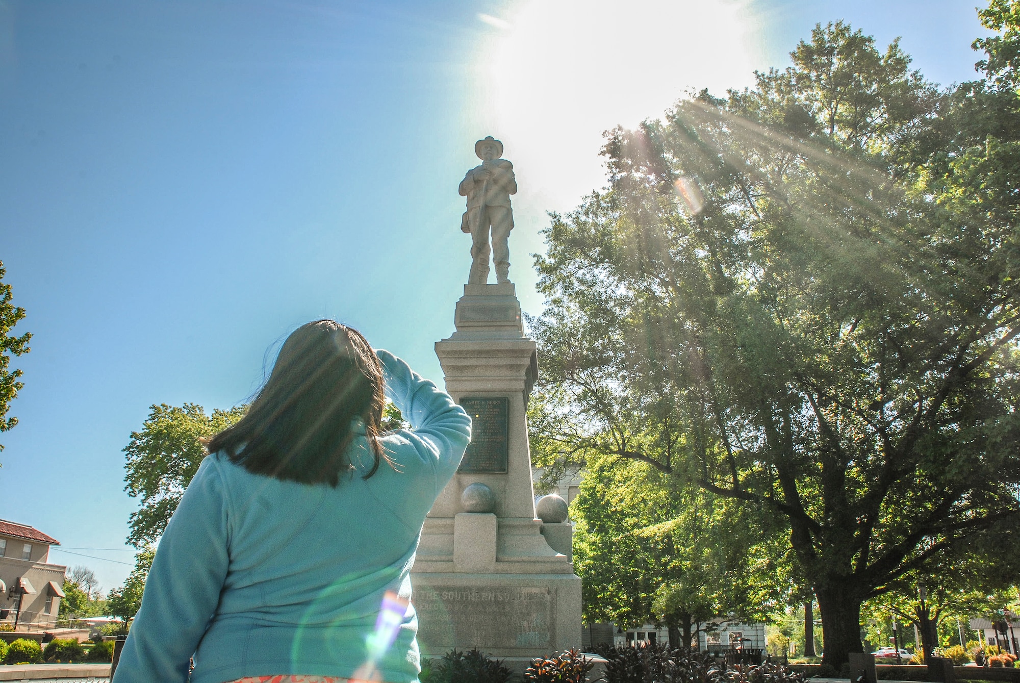 Cecelia Guadalupe Ortiz-Barreiro admires the view of the Confederate Soldier memorial in the townsquare May 12, 2013, in Bentonville, Ark. Bentonville, the 10th largest city in Arkansas, has several attractions for visitors including the picturesque townsquare as well as several art museum. (U.S. Air Force photo by Staff Sgt. Jake Barreiro)
 
