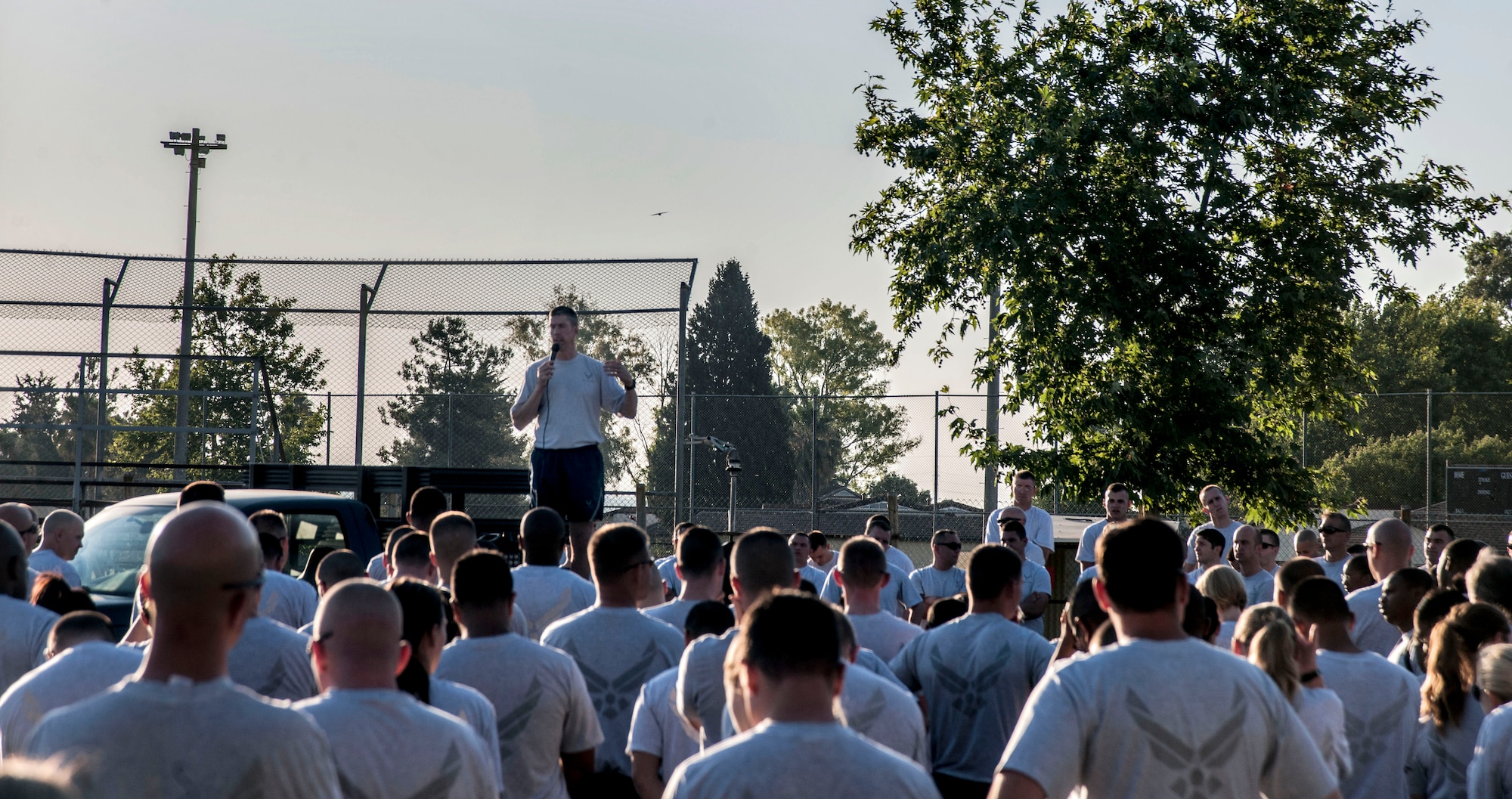 Col. Chris Craige, 39th Air Base Wing commander, speaks to Airmen during the start of a wing run June 19, 2013, at Incirlik Air Base, Turkey. The run was the kick-off event for the Sexual Assault Prevention and Response stand-down day observed throughout the Department of Defense. (U.S. Air Force photo by Senior Airman Anthony Sanchelli/Released)

