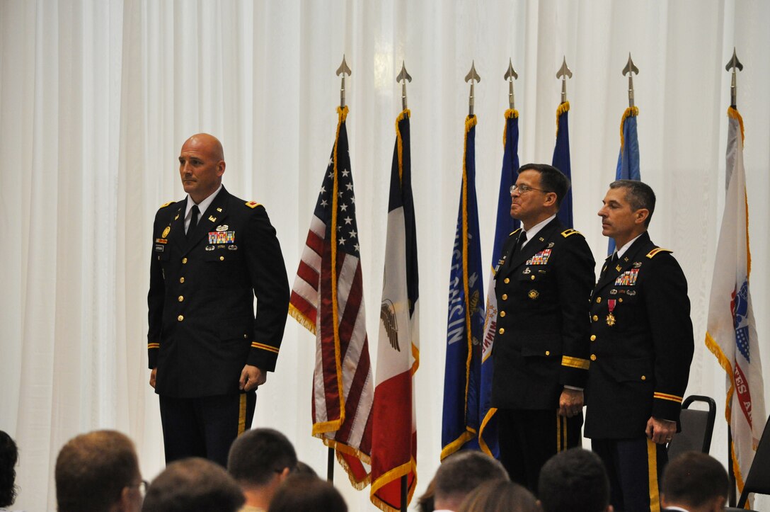 Col. Dan Koprowski stands before the St. Paul District change of command officer as the new district commander. Col. Koprowski took command of the St. Paul District at a ceremony on June 19, 2013.