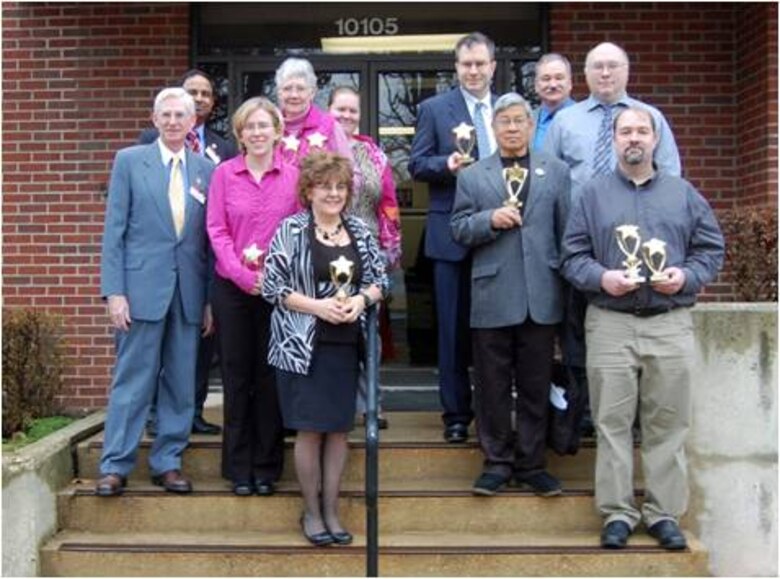 Erin Rooks (center left) and Cindy Wood (center) with other contest winners following the Toastmaster Area 11 contest held on February 23, 2013 in Fort Belvoir, Virginia.