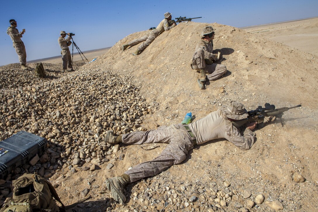 26th Marine Expeditionary Unit (MEU) Maritime Raid Force Marines engage long distance targets with various sniper rifles at a range in Jordan, June 10, 2013. Exercise Eager Lion 2013 is an annual, multinational exercise designed to strengthen military-to-military relationships and enhance security and stability in the region by responding to realistic, modern-day security scenarios. The 26th MEU is a Marine Air-Ground Task Force forward-deployed to the U.S. 5th Fleet area of responsibility aboard the Kearsarge Amphibious Ready Group serving as a sea-based, expeditionary crisis response force capable of conducting amphibious operations across the full range of military operations. (U.S. Marine Corps photograph by Sgt. Christopher Q. Stone, 26th MEU Combat Camera/Not Released)
