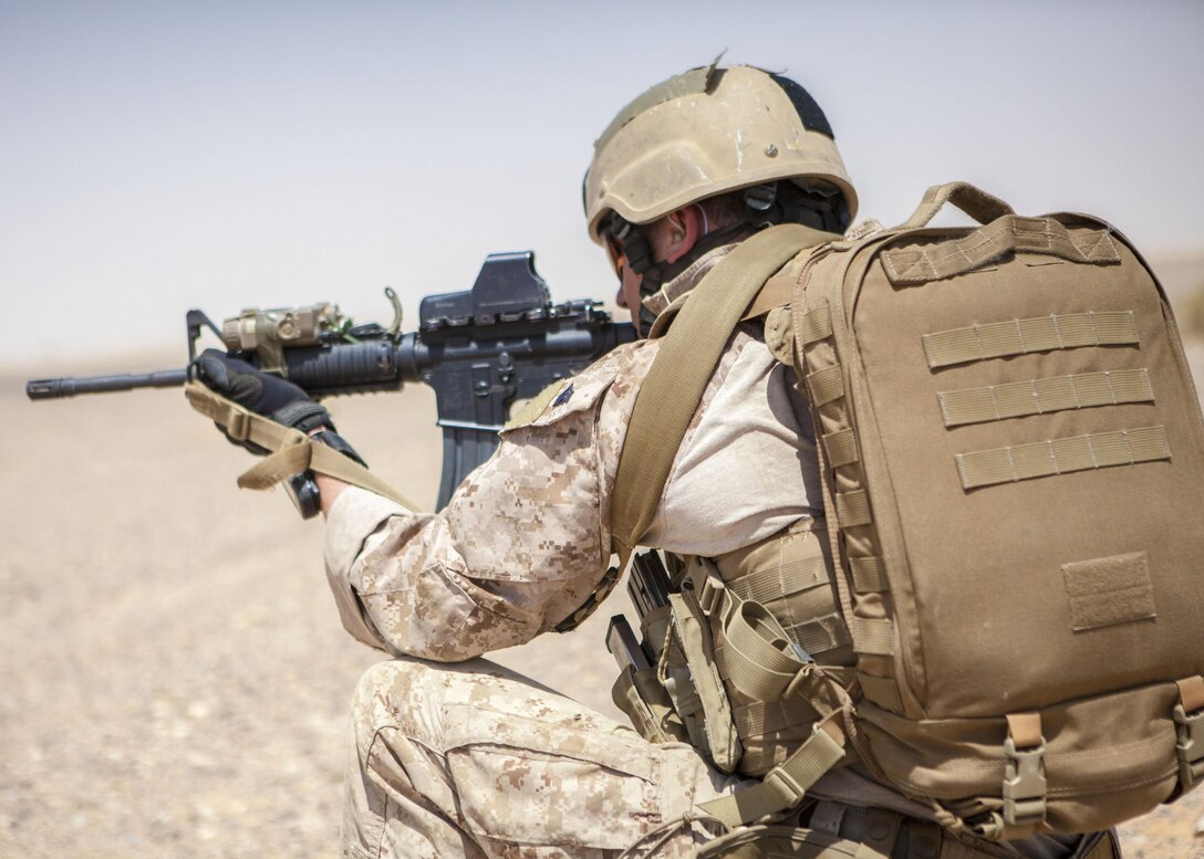 A 26th Marine Expeditionary Unit (MEU) Maritime Raid Force Marine engages simulated hostile targets during an immediate action drill exercise at a range in Jordan, June 13, 2013. Exercise Eager Lion 2013 is an annual, multinational exercise designed to strengthen military-to-military relationships and enhance security and stability in the region by responding to modern-day security scenarios. The 26th MEU is a Marine Air-Ground Task Force forward-deployed to the U.S. 5th Fleet area of responsibility aboard the Kearsarge Amphibious Ready Group serving as a sea-based, expeditionary crisis response force capable of conducting amphibious operations across the full range of military operations. (U.S. Marine Corps photograph by Sgt. Christopher Q. Stone, 26th MEU Combat Camera/Released)