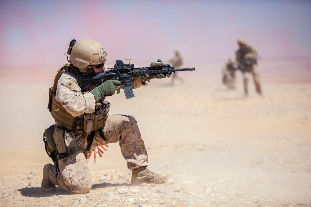 A 26th Marine Expeditionary Unit (MEU) Maritime Raid Force Marine engages simulated hostile targets during an immediate action drill at a range in Jordan, June 19, 2013. Exercise Eager Lion 2013 is an annual, multinational exercise designed to strengthen military-to-military relationships and enhance security and stability in the region by responding to modern-day security scenarios. The 26th MEU is a Marine Air-Ground Task Force forward-deployed to the U.S. 5th Fleet area of responsibility aboard the Kearsarge Amphibious Ready Group serving as a sea-based, expeditionary crisis response force capable of conducting amphibious operations across the full range of military operations.(U.S. Marine Corps photograph by Sgt. Christopher Q. Stone, 26th MEU Combat Camera/Released)