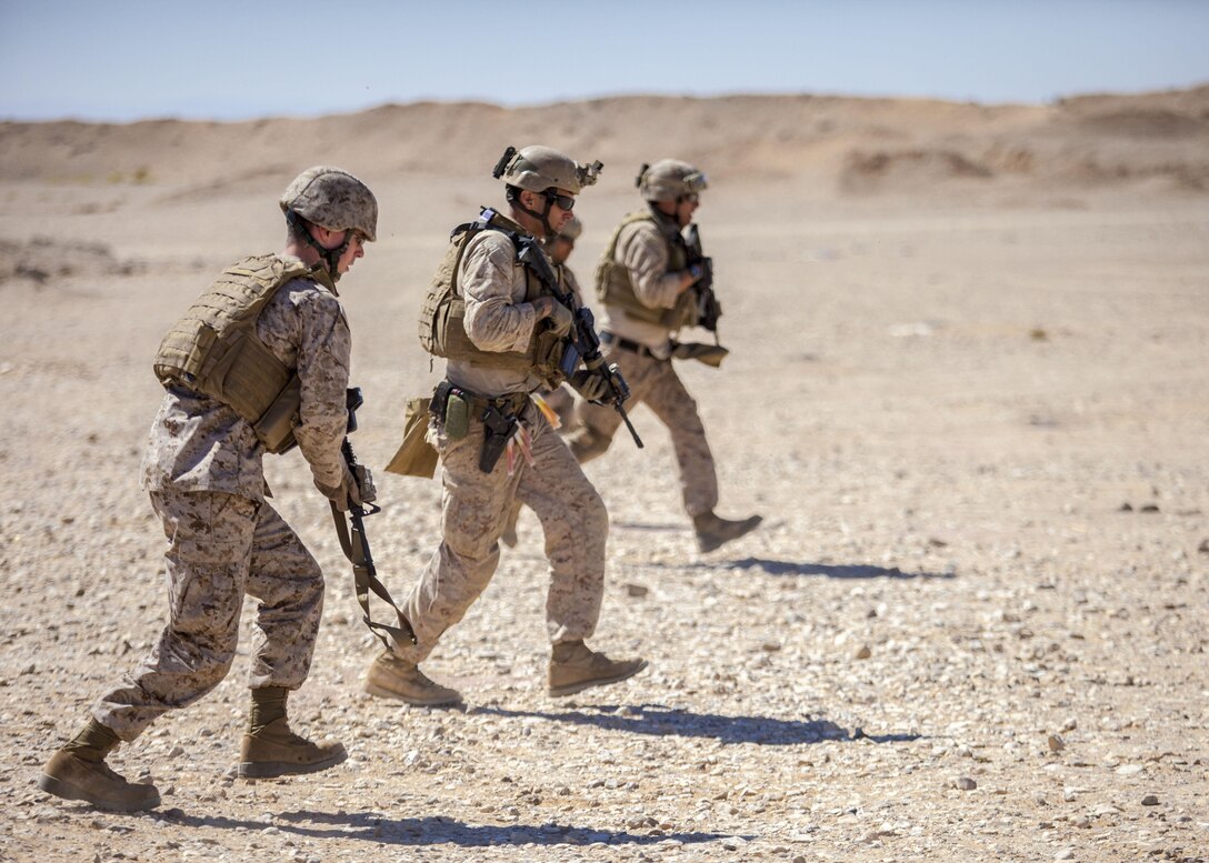 26th Marine Expeditionary Unit (MEU) Maritime Raid Force Marines bound back during an immediate action drill at a range in Jordan, June 19, 2013. Exercise Eager Lion 2013 is an annual, multinational exercise designed to strengthen military-to-military relationships and enhance security and stability in the region by responding to modern-day security scenarios. The 26th MEU is a Marine Air-Ground Task Force forward-deployed to the U.S. 5th Fleet area of responsibility aboard the Kearsarge Amphibious Ready Group serving as a sea-based, expeditionary crisis response force capable of conducting amphibious operations across the full range of military operations.(U.S. Marine Corps photograph by Sgt. Christopher Q. Stone, 26th MEU Combat Camera/Released)
