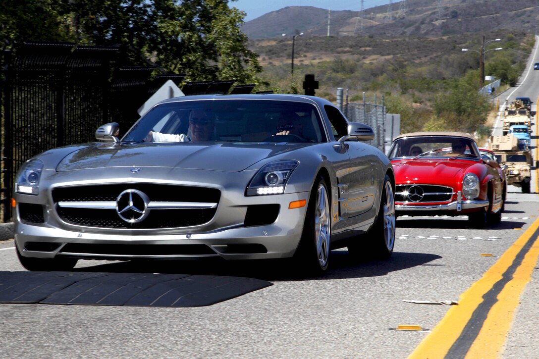 The Dana Point Concours' rode through the base during its inaugural Rallye Basilone Historic Tour of Camp Pendleton June 21. The collectible car owners drove from the Cristianitos gate to the Pacific Views Event Center here, stopping at the School of Infantry-West parade deck, and the Marine Corps Exchange.