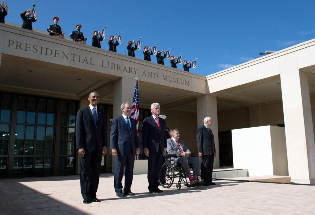 President Barack Obama, President George W. Bush, President Bill Clinton, President George H. W. Bush, and President Jimmy Carter arrive at the dedication of the George W. Bush Presidential Center.