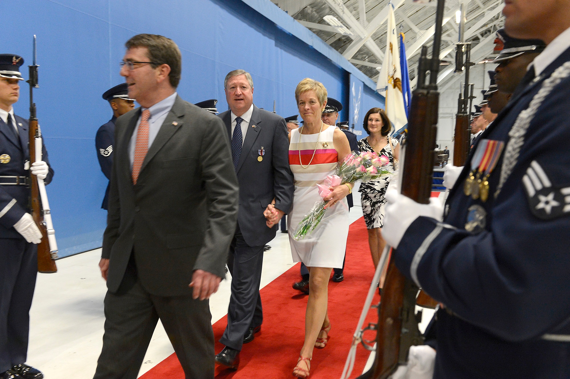 Secretary of the Air Force Michael Donley and his wife, Gail, are escorted from the farewell ceremony, June 21, 2013, at Joint Base Andrews, Md. Donley was confirmed as the 22nd secretary of the Air Force, Oct. 2, 2008. He had been serving as the acting secretary since June of that year, as well as for seven months in 1993, making him the longest-serving secretary of the Air Force in the serviceÕs history. (U.S. Air Force photo/Scott M. Ash)