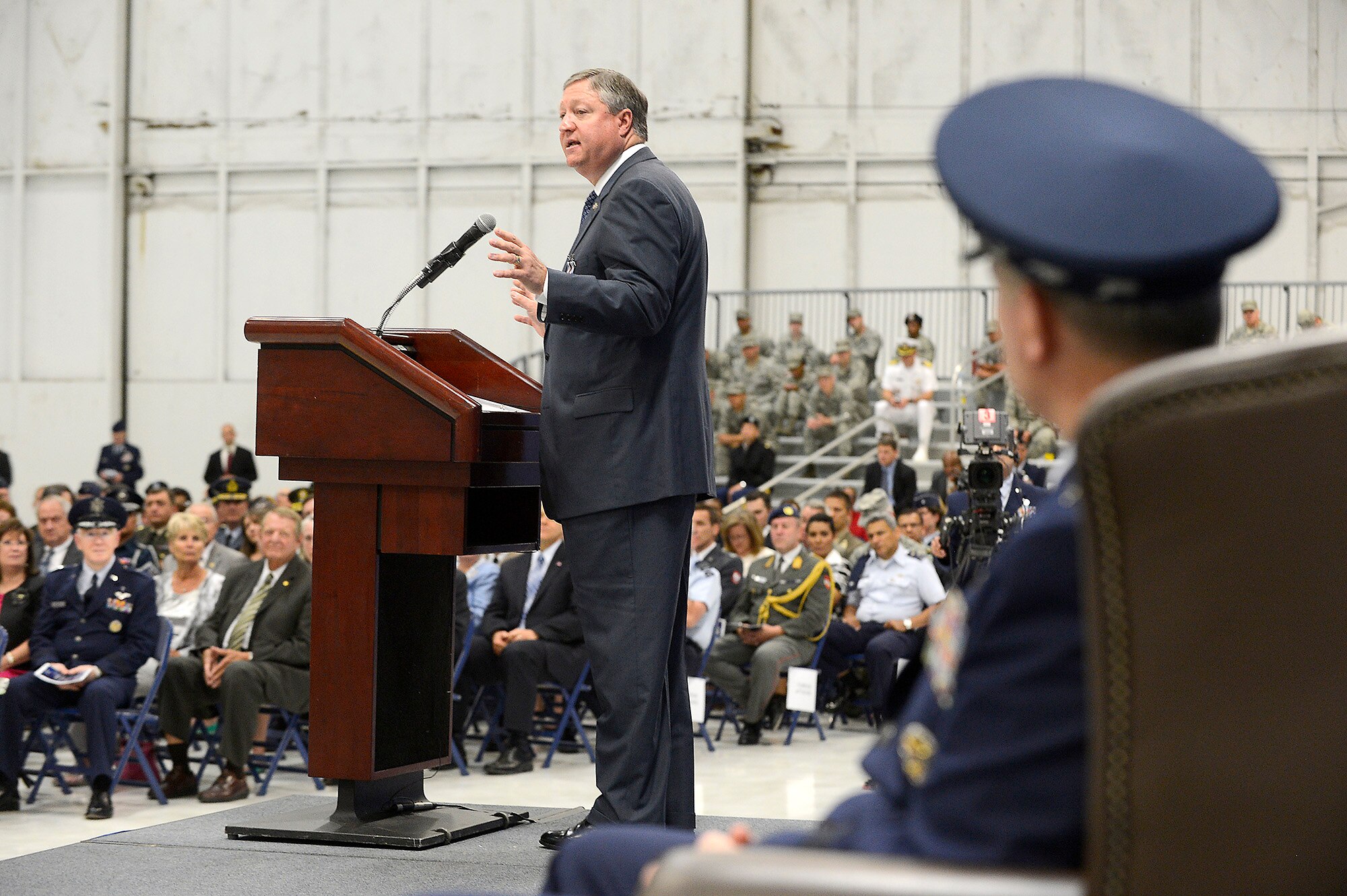 Secretary of the Air Force Michael Donley speaks to the audience during his farewell ceremony June 21, 2013, at Joint Base Andrews, Md. Donley was confirmed as the 22nd secretary of the Air Force, Oct. 2, 2008.  He had been serving as the acting secretary since June of that year, as well as for seven months in 1993, making him the longest-serving secretary of the Air Force in the serviceÕs history. Under Secretary of the Air Force Eric Fanning will serve as the acting secretary until the President nominates and the Senate confirms a replacement.  (U.S. Air
Force photo/Scott M. Ash)