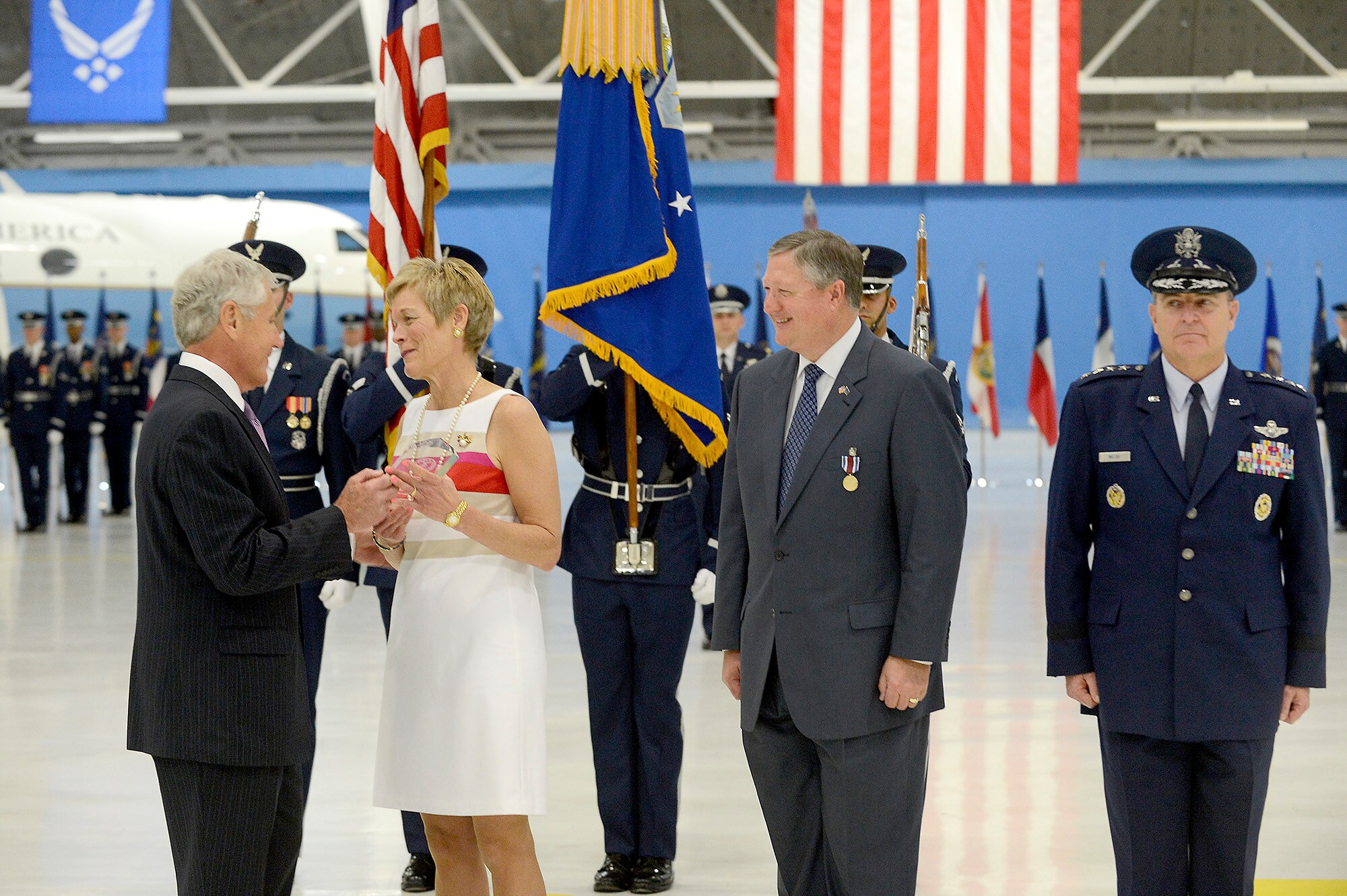 Secretary of Defense Chuck Hagel recognizes Gail Donley, wife of Secretary of the Air Force Michael Donley, for her support of Airmen and their families, during a farewell ceremony, June 21, 2013, at Joint Base Andrews, Md. Donley was confirmed as the 22nd secretary of the Air Force, Oct. 2, 2008. He had been serving as the acting secretary since June of that year, as well as for seven months in 1993, making him the longest-serving secretary of the Air Force in the serviceÕs history.  (U.S. Air Force photo/Scott M. Ash)