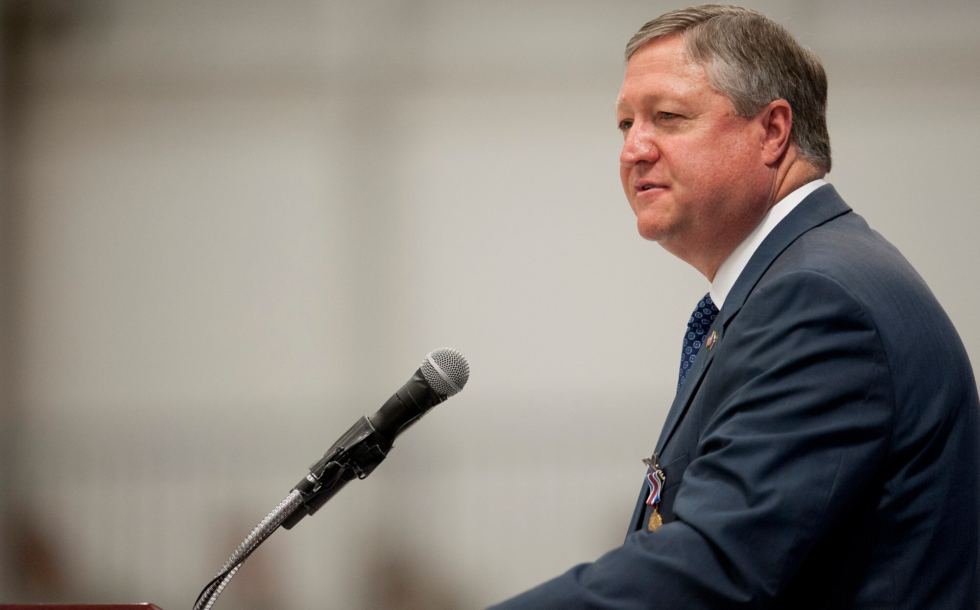 Secretary of the Air Force Michael Donley addresses the audience during a farewell ceremony, June 21, 2013, at Joint Base Andrews, Md. Donley was confirmed as the 22nd secretary of the Air Force, Oct. 2, 2008. He had been serving as the acting secretary since June of that year, as well as for seven months in 1993, making him the longest-serving secretary of the Air Force in the service’s history. (U.S. Air Force photo/Senior Airman Carlin Leslie)
