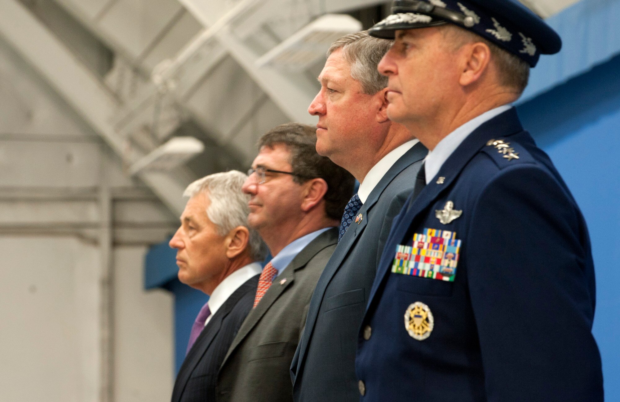 Secretary of Defense Chuck Hagel, Deputy Secretary of Defense Ash Carter, Secretary of the Air Force Michael Donley and Air Force Chief of Staff Gen. Mark A. Welsh III stand attention for the presentation of the colors during a farewell ceremony in Donley’s honor, June 21, 2013, at Joint Base Andrews, Md. Donley was confirmed as the 22nd secretary of the Air Force, Oct. 2, 2008. He had been serving as the acting secretary since June of that year, as well as for seven months in 1993, making him the longest-serving secretary of the Air Force in the service’s history. Under Secretary of the Air Force Eric Fanning will assume the role of acting secretary until the President nominates and the Senate confirms a replacement.  (U.S. Air Force photo/Senior Airman Carlin Leslie)
