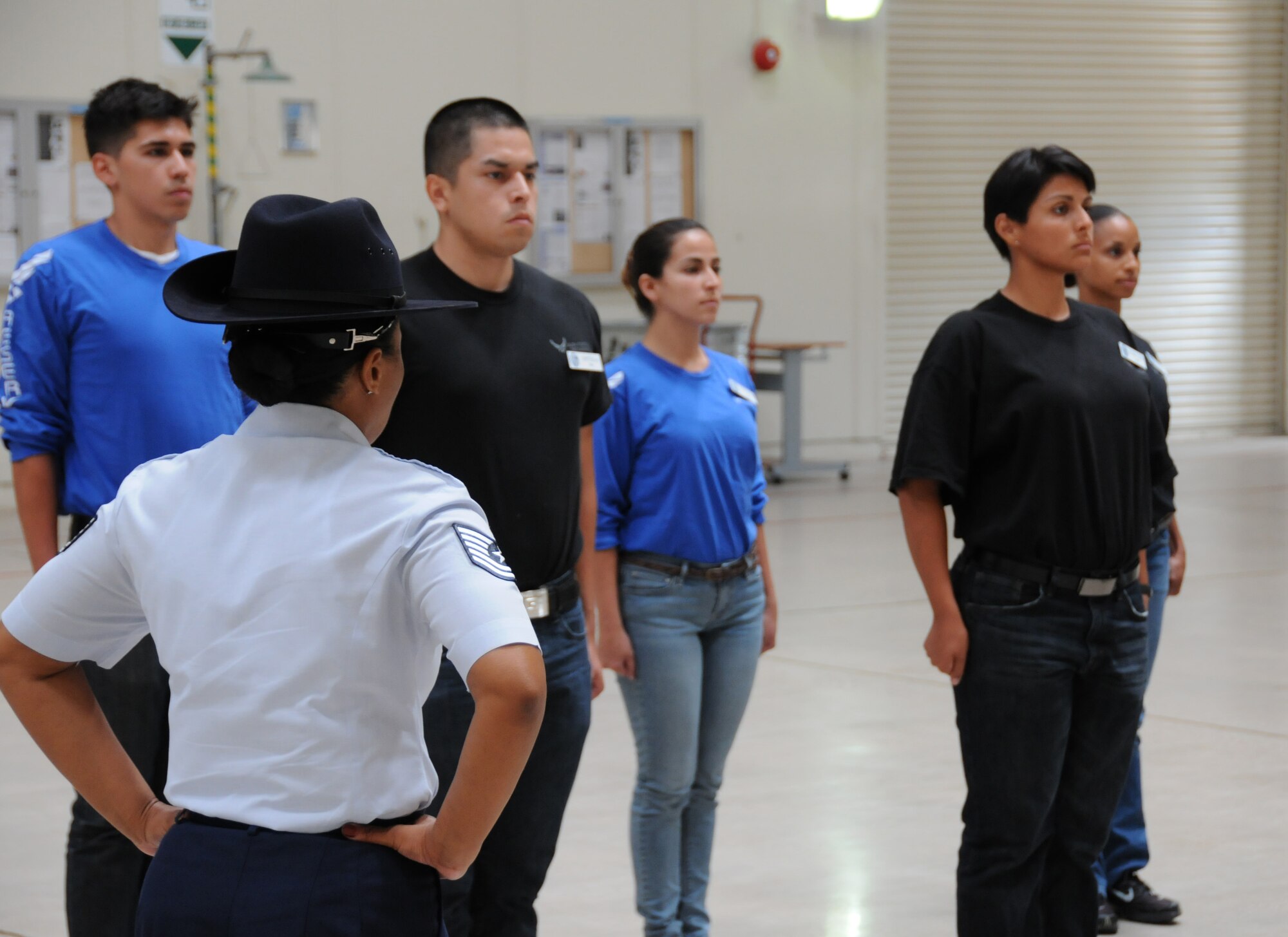 Tech. Sgt. Tammanica Rogers, 433rd Training Readiness Squadron Reserve Training instructor, visiting from Lackland Air Force Base, gives advice on how to excel during basic military training to new recruits from the 944th Fighter Wing. (U.S. Air Force photo/Staff Sgt. Josh Nason) 