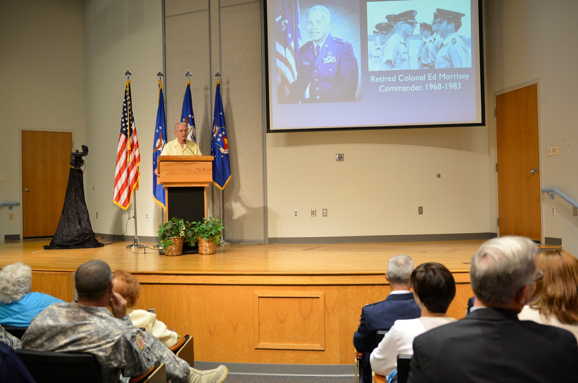 MCGHEE TYSON AIR NATIONAL GUARD BASE, Tenn. – Retired Col. Edmund C. Morrisey, first commander at the I.G. Brown Training and Education Center, 1968 – 1983, commemorates the TEC’s 45th anniversary in front of former faculty and staff, their families and current staff members in Spruance Hall here, June 21, 2013. The I.G. Brown Training and Education Center provides professional military education which serves all of the nation's Air National Guard units as well as the total U.S. Air Force and U.S. Coast Guard. TEC's single mission remains timeless: to engage, educate and inspire leaders responsible for our nation's defense. (U.S. Air National Guard photo by Master Sgt. Kurt Skoglund/Released)