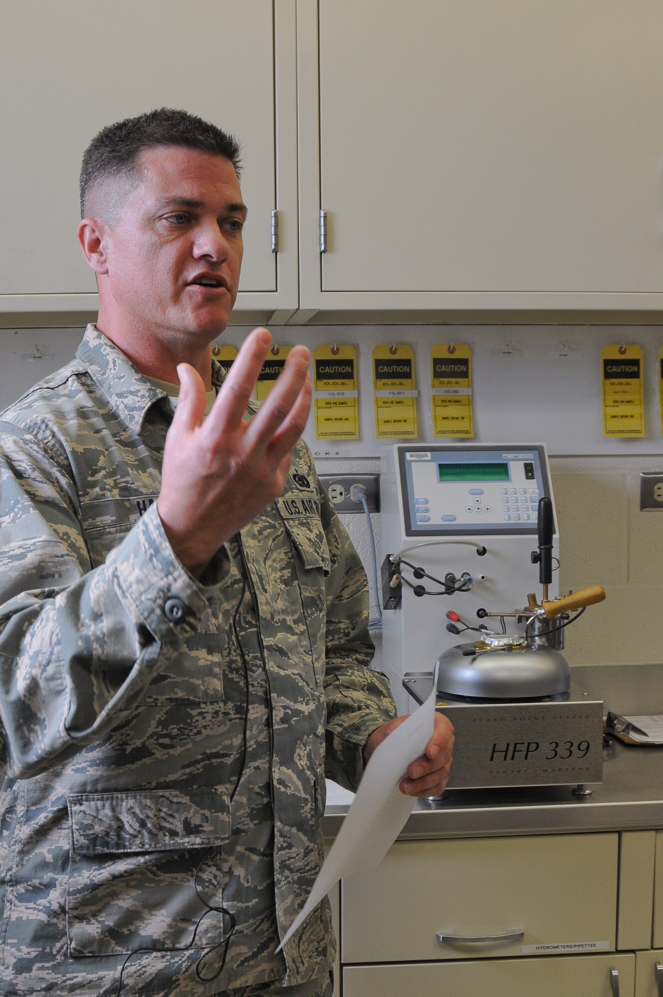 Tech. Sgt. Brian Hain, Fuels Technician, thoroughly describes the JP-8 jet fuel testing and filtration process all the way from the pipeline source to fueling the jets on the flight line at the 124th Fighter Wing Logistics Readiness Squadron open house at Gowen Field July 13. The routine testing saved equipment and possibly lives in 2009 when fuel contaminants were discovered and flying operations were halted until the source was identified and contaminants were cleared. (Air National Guard Photo by Tech. Sgt. Sarah Pokorney)