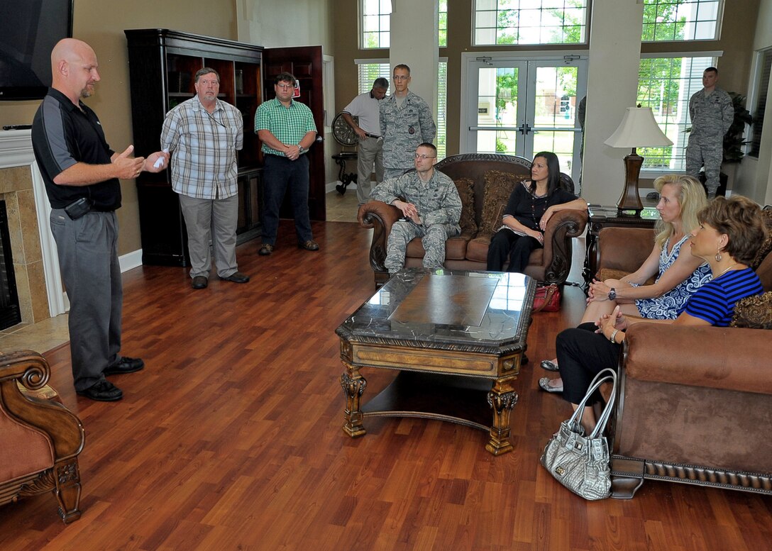 Anthony Williams, Housing Maintenance Supervisor, addresses Teresa Rice, wife of Gen. Edward A. Rice Jr., commander of Air Education and Training Command, and Columbus Air Force Base’s spouses and leaders at the Hunt Housing Complex June 18. After his briefing, he allowed members of the group to ask questions regarding numerous topics such as housing allowances. (U.S. Air Force Photo/Airman 1st Class Stephanie Englar)